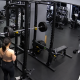 CCTV-style view inside a Chinese gym showing a squat rack and loaded barbell before a safety incident