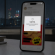 Realistic editorial image of a smartphone showing a generic blurred Chinese social media moderation notice over a fast food Thursday promotion graphic