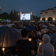 People gather with candles and umbrellas at Liberty Square in Taipei during a June 4 Tiananmen anniversary memorial.