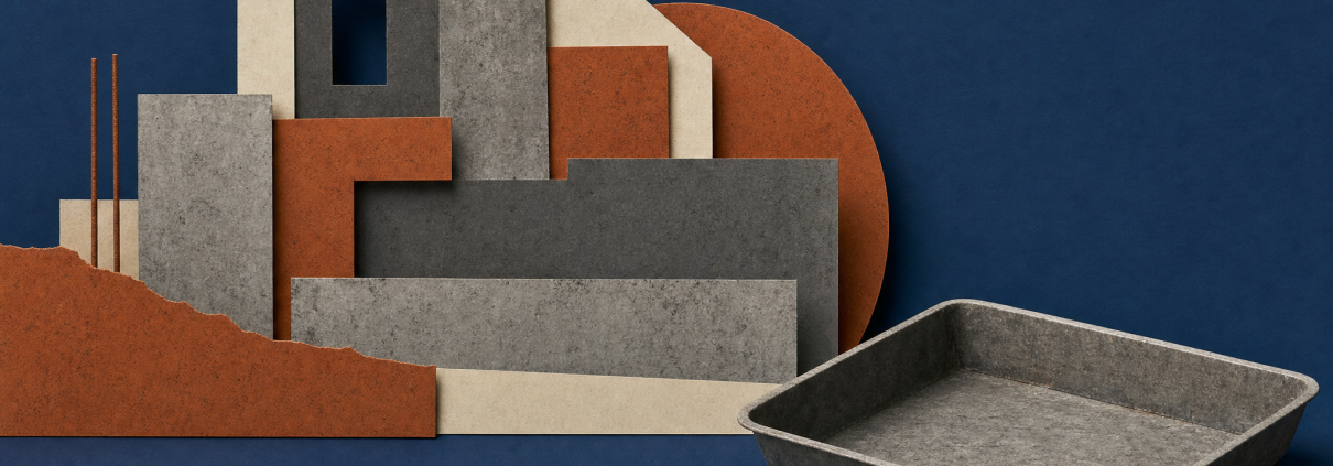 Cut-paper building shapes beside a plastering trowel, an empty tray and blank paper slips on an indigo background.
