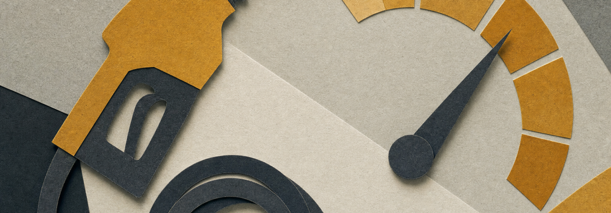 Cut-paper fuel nozzle and coiled hose beside a segmented amber gauge on charcoal and pale gray geometric layers.